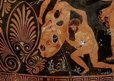 decorative Sisyphus pushing the boulder up the hill